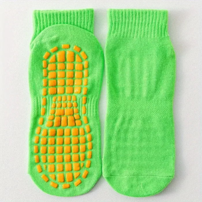 Anti-Skid Yoga Socks, made with Bamboo and Spandex in vibrant colours. These women's yoga socks are the perfect companion for your yoga, Pilates, dance, or ballet sessions, offering comfort, grip, and hygiene all in one. Crafted with a blend of bamboo and spandex, these socks are not only soft and breathable but also naturally antibacterial. The bamboo fabric helps to prevent the growth of odour-causing bacteria, keeping your feet fresh and odour-free throughout your workout. Designed with anti-skid grips, these socks provide excellent traction, enhancing your balance and stability during your exercises. Whether you're holding a yoga pose, practicing your dance moves, or engaging in a Pilates routine, these socks will help you maintain your grip and prevent slipping.The pack includes three pairs of socks in a variety of vibrant colours, adding a touch of fun and style to your workout attire. The free size design ensures a comfortable fit for most foot sizes, offering a snug yet stretchy feel that conforms to your feet's shape. Not only are these socks practical and functional, but they are also easy to care for. Simply toss them in the washing machine for a quick and convenient clean, making them a hassle-free choice for your active lifestyle. Elevate your fitness routine with these versatile and stylish socks today.